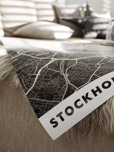 Cartida-Karte von Stockholm liegt auf Sofa